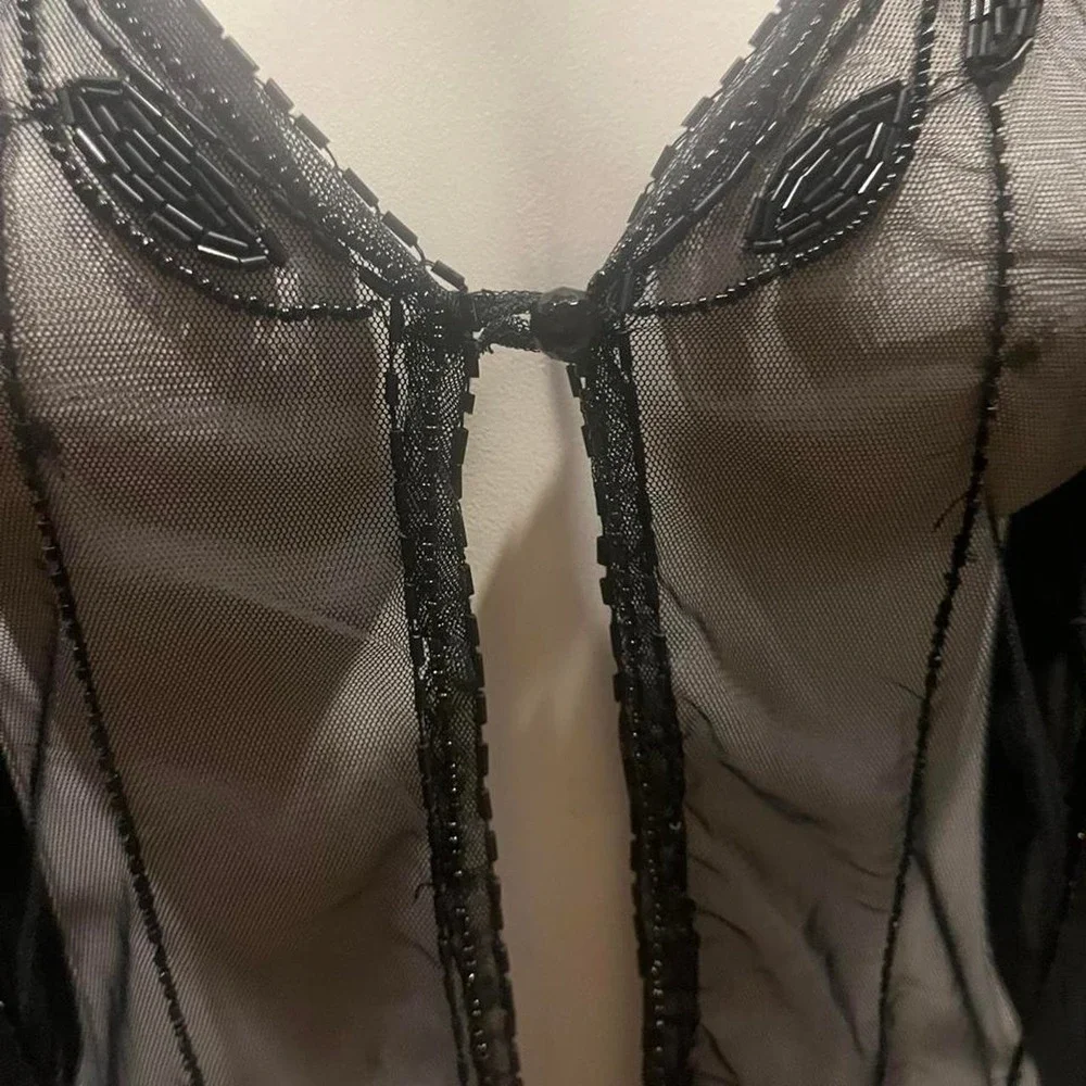 Black sheer beaded cardigan with lace trim and beaded fringe Whimsygoth
